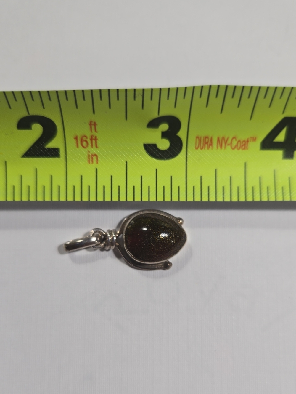 Sterling Silver Teardrop Pendant with Amber Color Gemstone